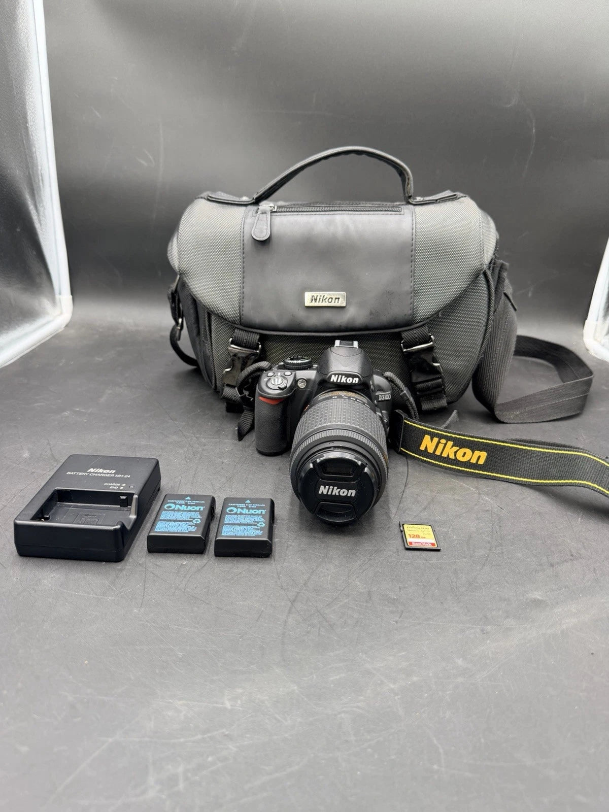 Nikon D3100 Cámara DSLR + lente AF-S DX NIKKOR 55–200mm VR.